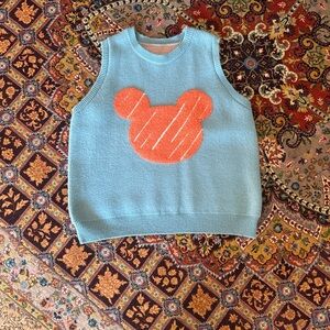 Oversized Blue Sleeveless Sweater with Orange Bear Design